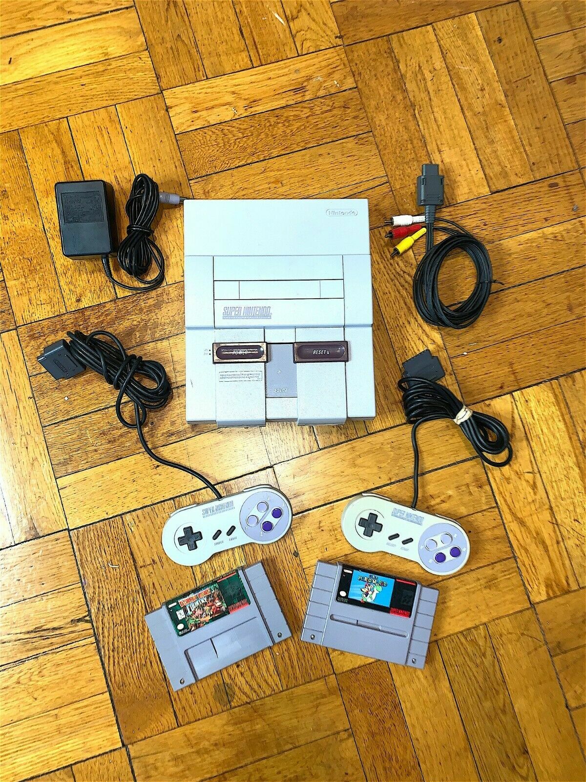 Super Nintendo SNES Console w/ OEM Controllers + w/ Mario World & Donkey Kong Super Nintendo SNES Console w/ OEM Controllers + w/ Mario World & Donkey Kong
