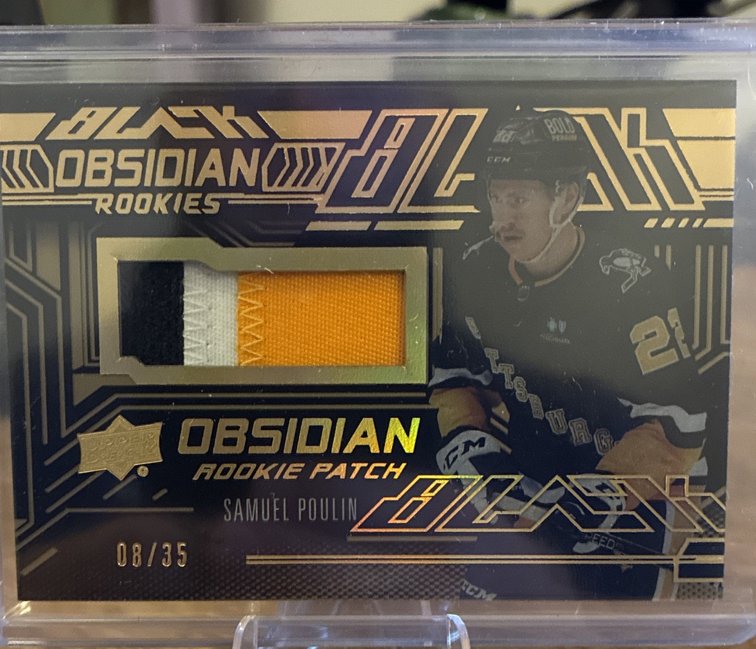 2022-23 UD SPX Black Obsidian Samuel Poulin #ORJ-PO Gold Jersey Patch /35 RC 2022-23 UD SPX Black Obsidian Samuel Poulin #ORJ-PO Gold Jersey Patch /35 RC