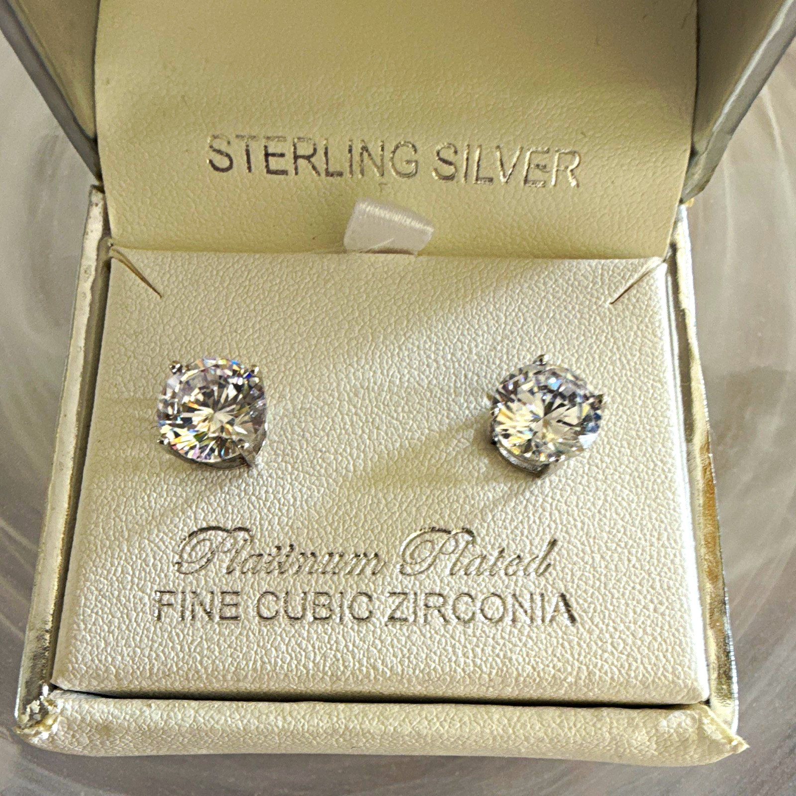 Crislu 925 Sterling Silver platinum Plated Round Cubic Zirconia stud Earrings