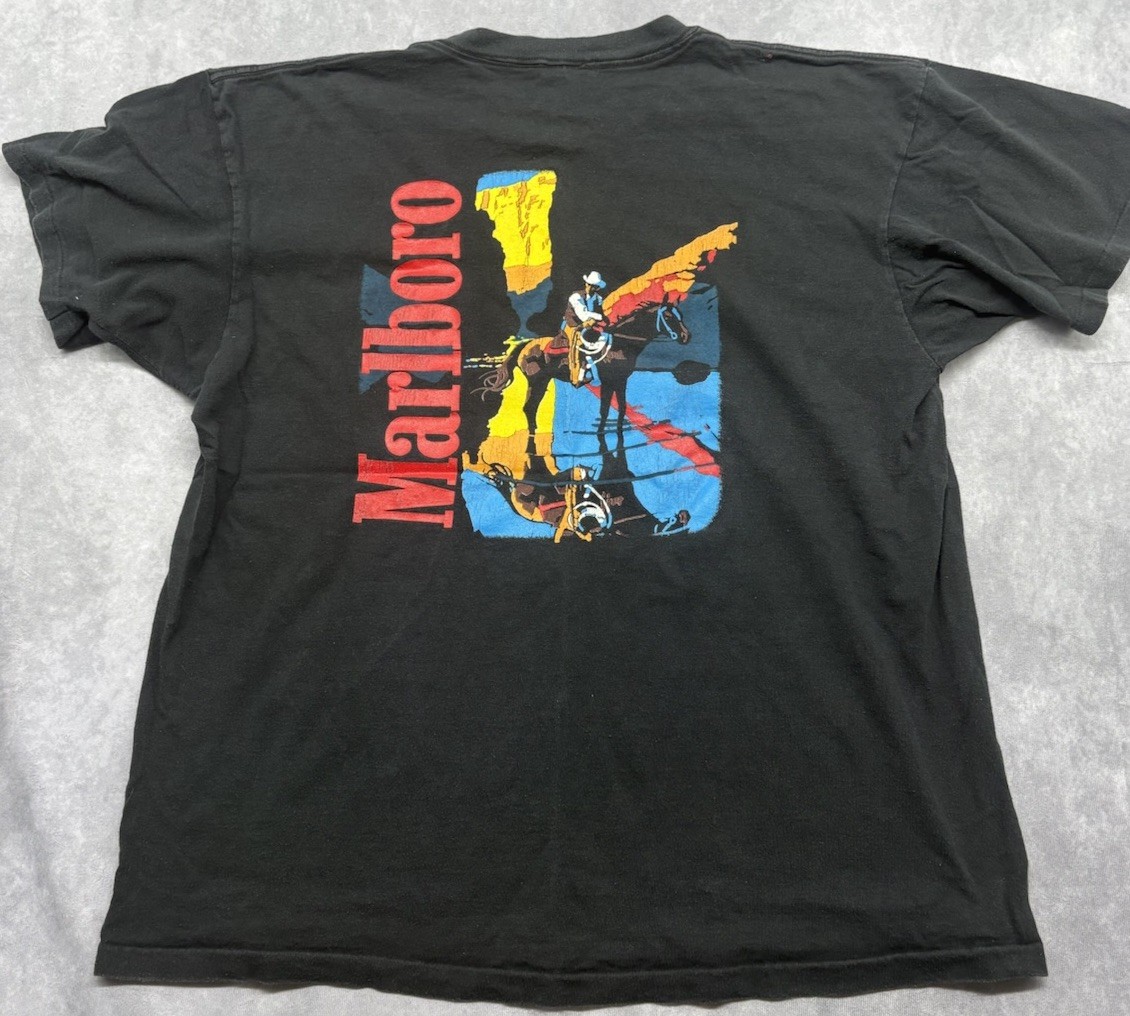 Vintage Marlboro Cowboy Pocket T-Shirt XL Black Delta Made in USA Graphic Tee Vintage Marlboro Cowboy Pocket T-Shirt XL Black Delta Made in USA Graphic Tee