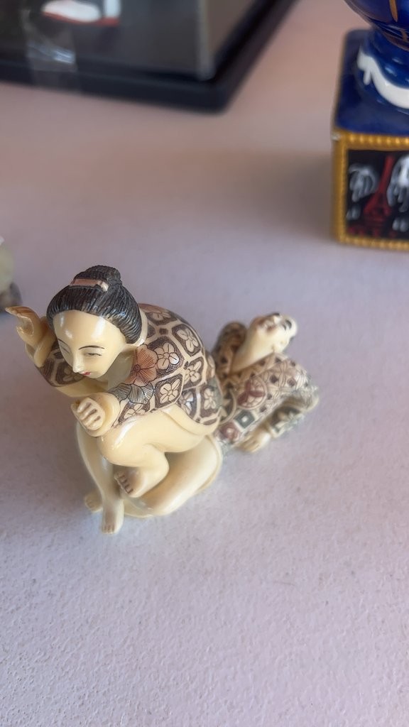 Vintage Japanese Netsuke Figurine with Intricate Detailing Vintage Japanese Netsuke Figurine with Intricate Detailing