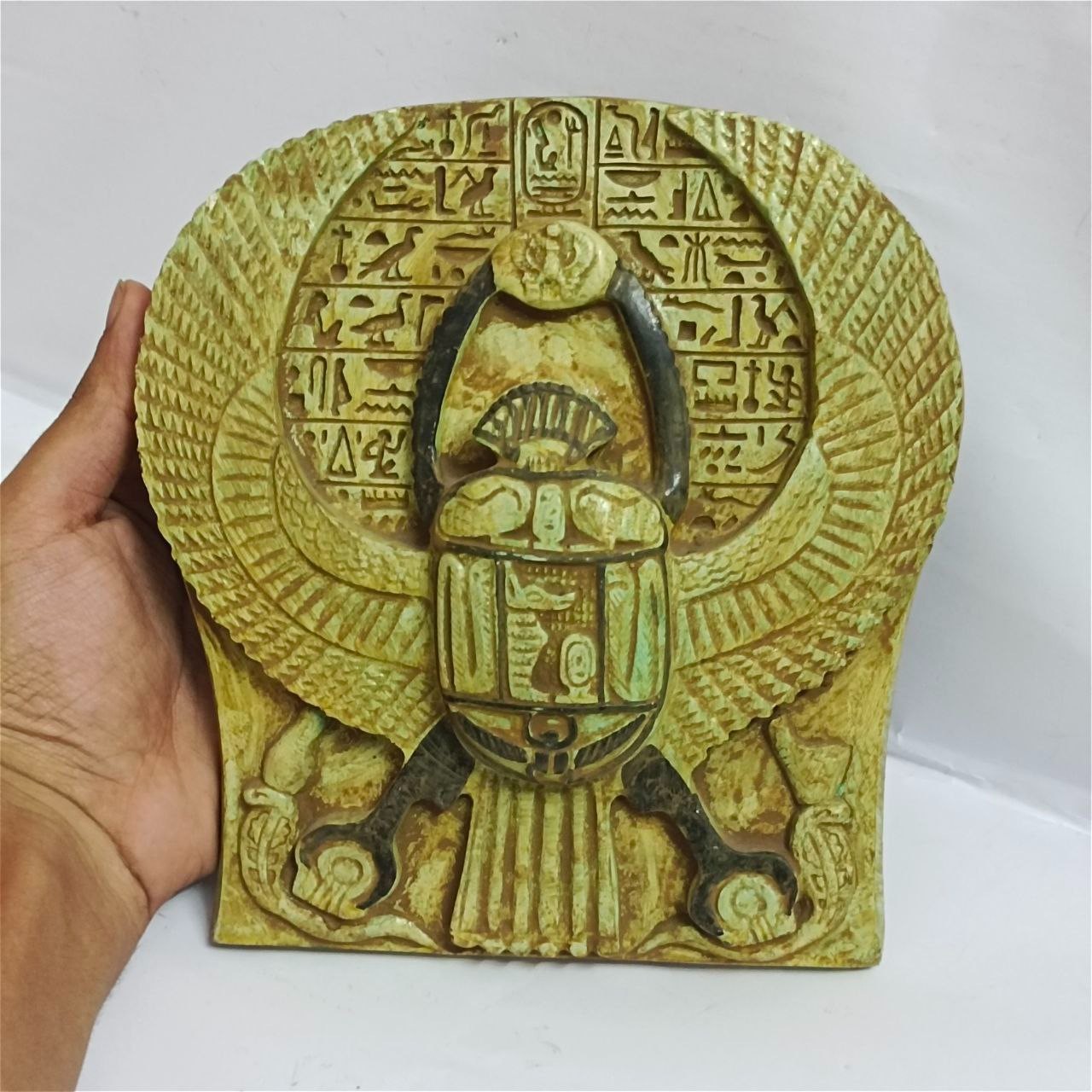 Vintage-style scarab relief symbolizing rebirth in ancient Egyptian culture Vintage-style scarab relief symbolizing rebirth in ancient Egyptian culture
