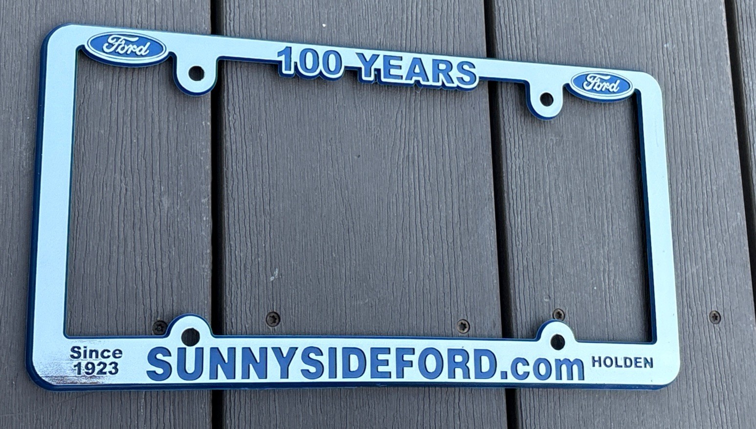 Vintage Sunnyside Ford Dealership Advertising License Plate Frame 100 Years NOS