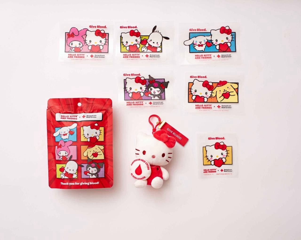 American Redcross X Hello Kitty Plush Bag & Surprise Stickers (unopened) American Redcross X Hello Kitty Plush Bag & Surprise Stickers (unopened)