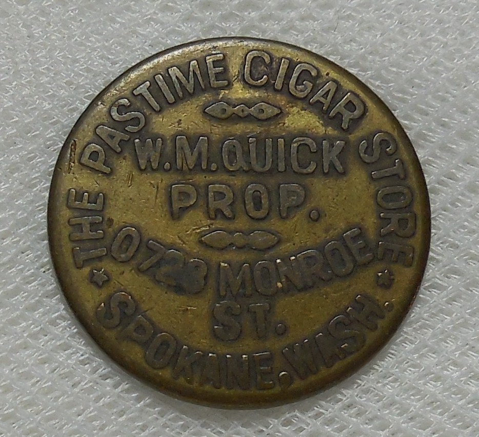SPOKANE WASHINGTON THE PASTIME CIGAR STORE W. M. QUICK 25¢ TRADE TOKEN SPOKANE WASHINGTON THE PASTIME CIGAR STORE W. M. QUICK 25¢ TRADE TOKEN