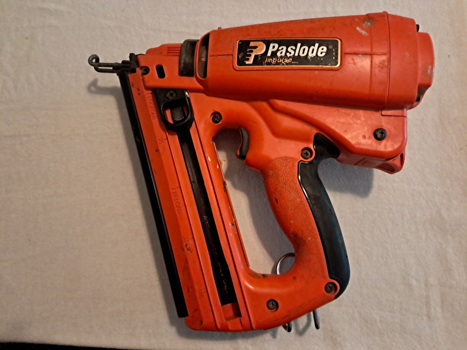 PASLODE IM250A CORDLESS 16 GAUGE ANGLED FINISHING NAILER - 900600 PASLODE IM250A CORDLESS 16 GAUGE ANGLED FINISHING NAILER - 900600