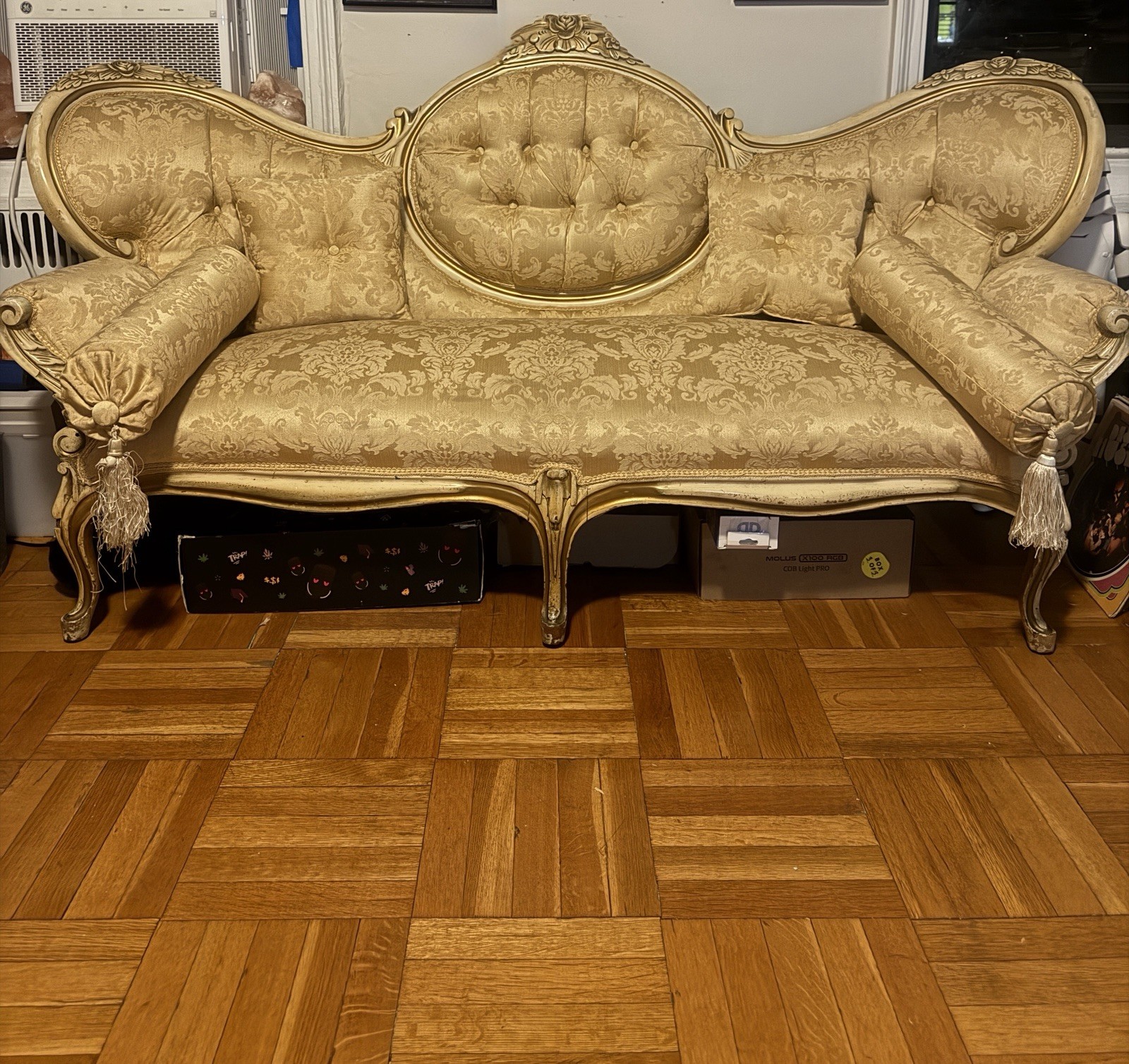 Rare Vintage French-inspired vintage gold damask sofa with a carved gilded frame