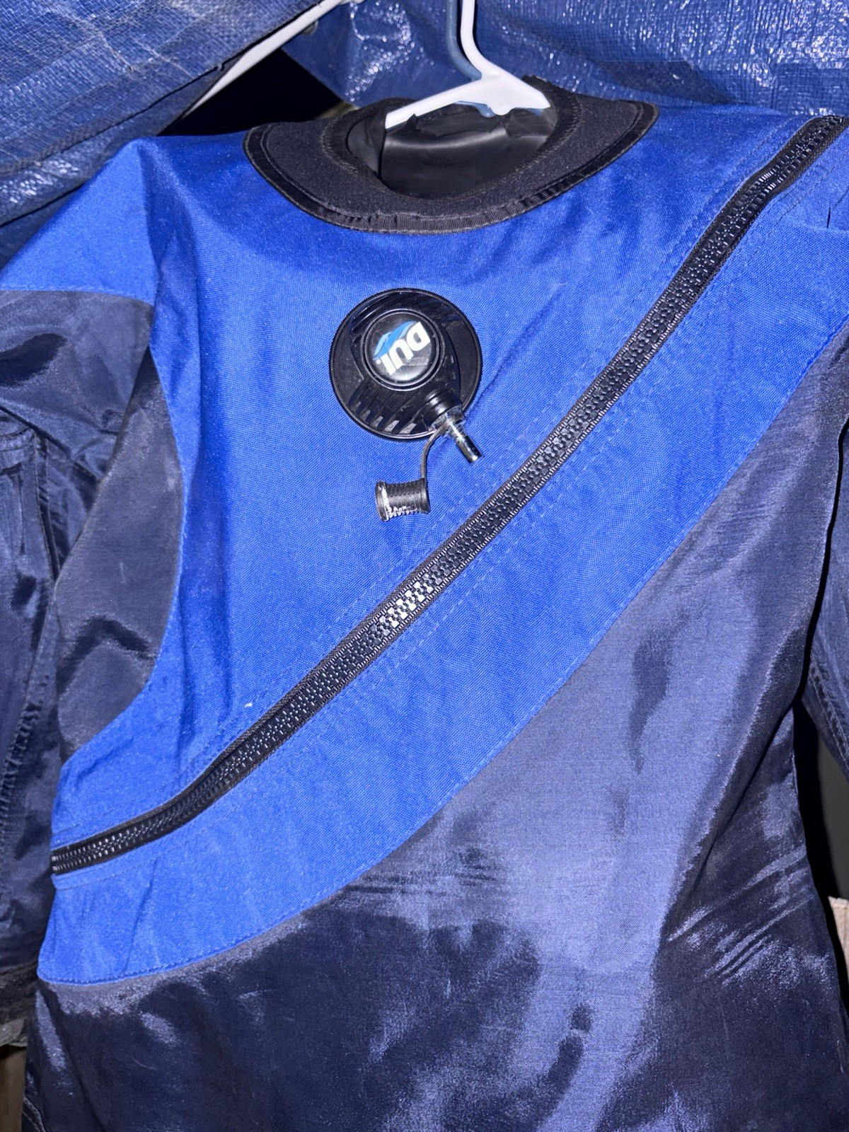 DUI Blue/Black Scuba Drysuit w/ Front Zip & Chest Inflator Valve DUI Blue/Black Scuba Drysuit w/ Front Zip & Chest Inflator Valve
