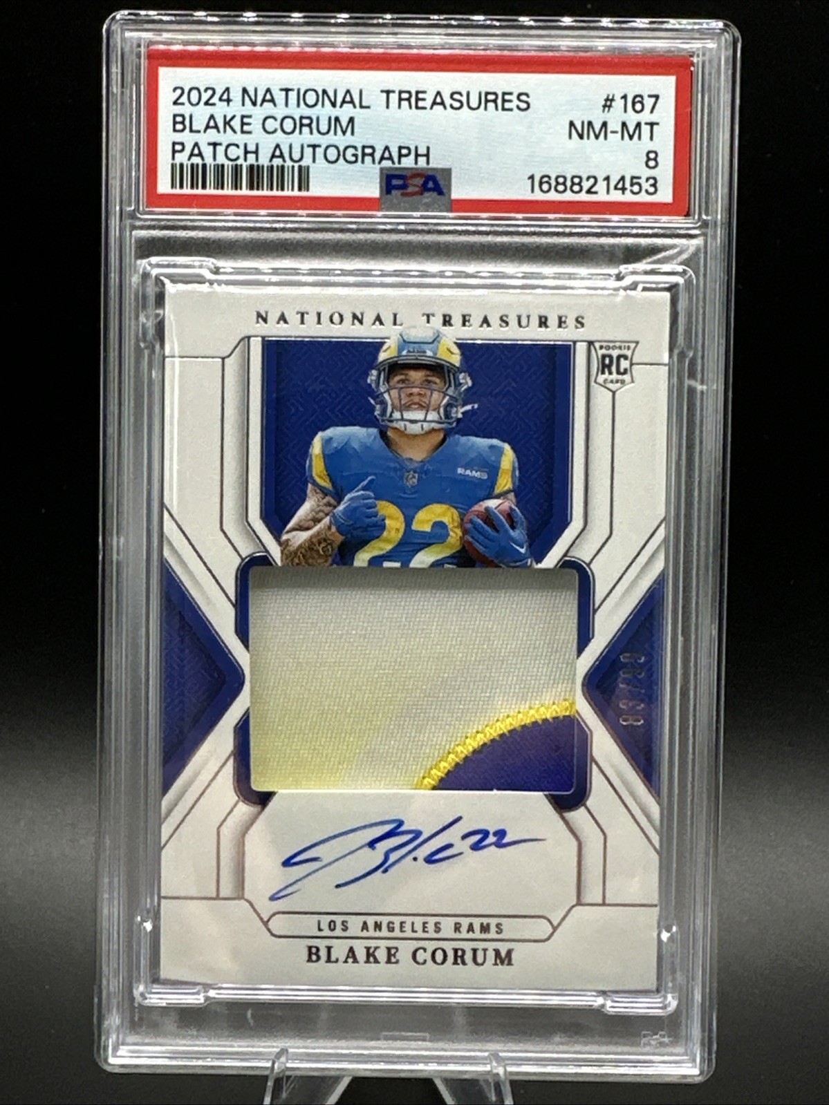 2024 Panini National Treasures Patch Autographs Blake Corum /99 PSA 8 NM-MT (RC)