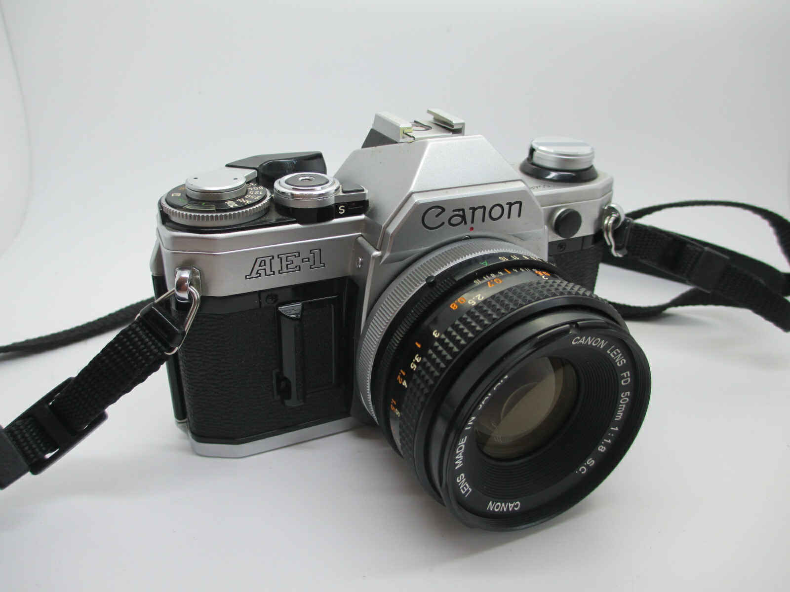 Canon AE-1 35mm SLR Film Camera with Canon 50mm f/1.8 FD Lens - WORKING PERFECT