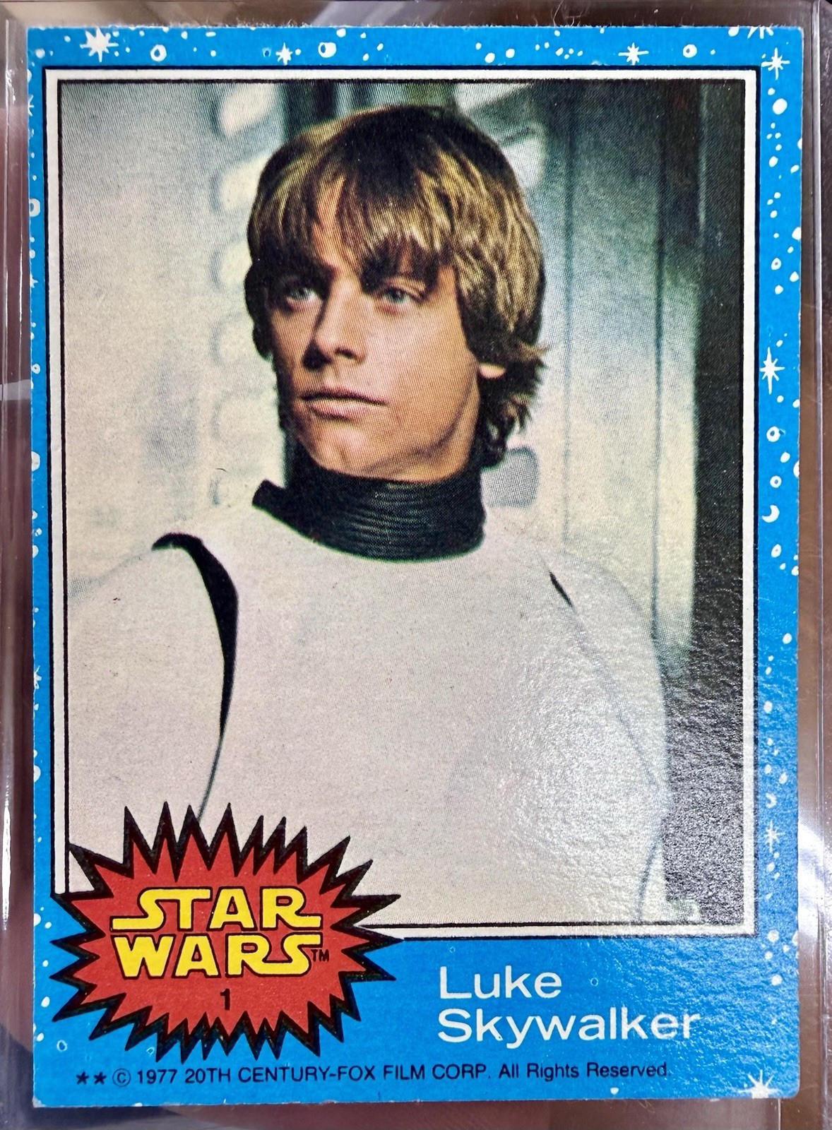 1977 Topps Star Wars Luke Skywalker Blue Series 1 Rookie Card #1 1977 Topps Star Wars Luke Skywalker Blue Series 1 Rookie Card #1