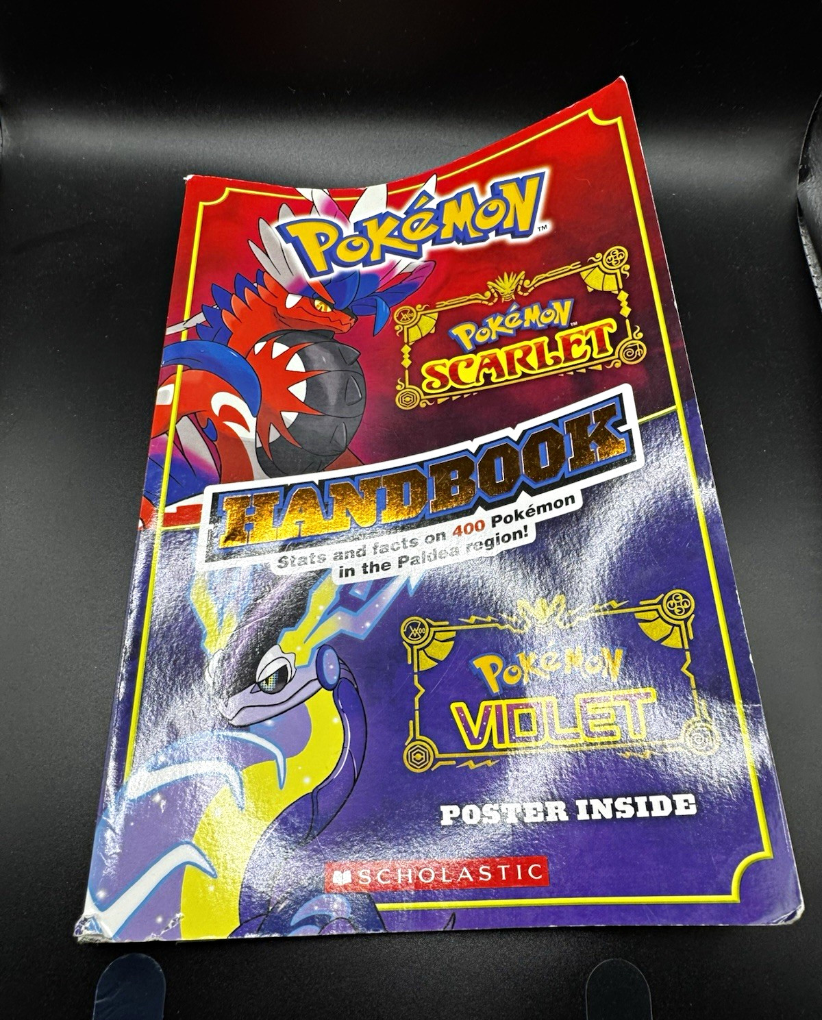 Scholastic Pokémon Scarlet & Violet Handbook Paperback w/ Poster Inside 2023 Scholastic Pokémon Scarlet & Violet Handbook Paperback w/ Poster Inside 2023