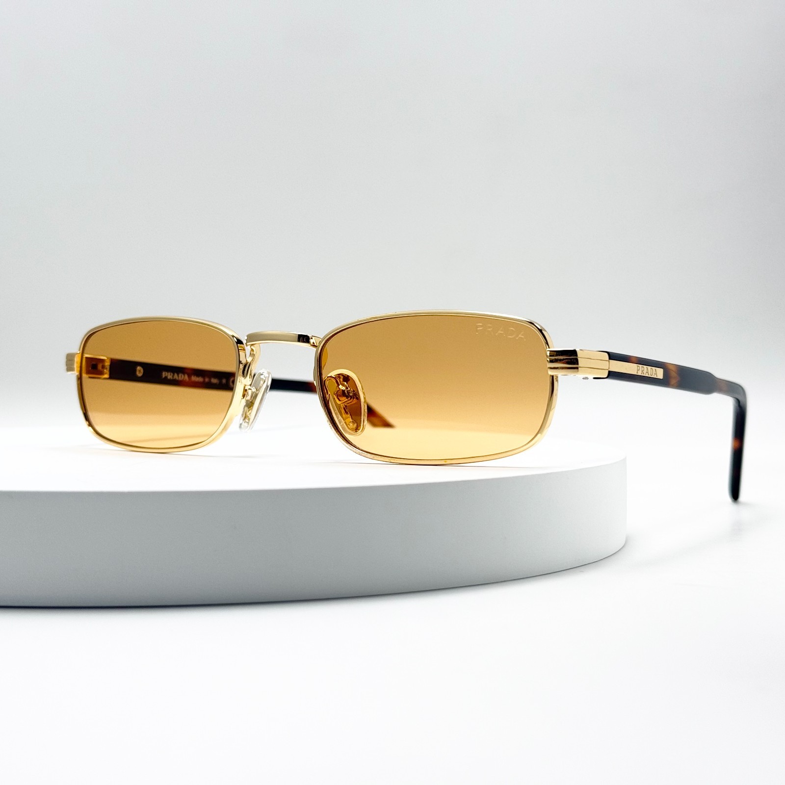 Prada PRB54S Rectangle Sunglasses Gold Frame Yellow Lens Havana Temples 54mm