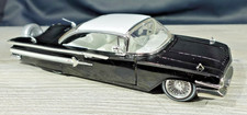 Jada Toys 1960 Chevrolet Impala Black/White 1/24 picture