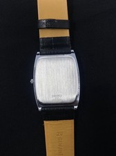 Vintage Seiko Quartz Watch: Slim Rectangle, White Dial, Genuine Leather Strap. picture