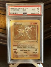1999 POKEMON FOSSIL #7 HITMONLEE-HOLO PSA 8 NM-MT perfect swirl spec on finger  picture