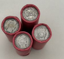 TIGHTLY CRIMPED RED BANK WRAPPED ROLLS OF WHEAT CENTS WITH BARBER DIMES SHOWING picture