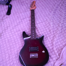 First Act 6-String Solid Body Electric Guitar Black Dual Humbuckers Tremolo picture