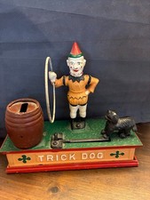 Vintage Cast Iron Trick Dog Coin Bank picture