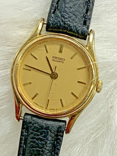 Vintage Dainty Seiko Quartz Ladies Watch 2C21-0029 Gold Tone Round Dial Working picture