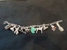 #830--VINTAGE STERLING SILVER CHARM BRACELET-10 CHARMS-925 OLD STERLING picture