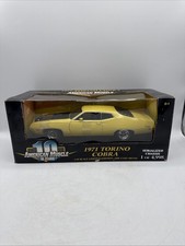Ertl American Muscle 1971 Ford Torino Cobra Yellow/Black DieCast Car 1:18 Scale picture