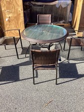 7 Piece Brown Patio Dining Set with Glass Table & Stackable Chairs Pre Owned picture