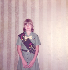 1970s Young Girl Wearing Girl Scout Uniform Sash With Patches Vintage Photo picture
