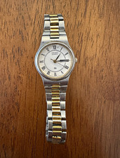 Seiko Quartz Women’s Two-Tone Silver/Gold Bracelet Watch White Dial Day/Date picture