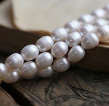 Natural 11-12mm White Freshwater Pearl Rice Oval Shaped Loose Beads 15