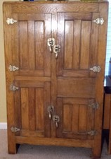 Large, 4door, antique vintage oak ice box beautifully refinished inside and out. picture