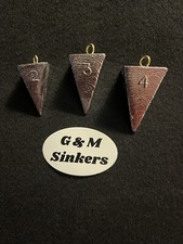 Assortment of Pyramid 11-2oz, 10-3oz, and 8-4oz Fishing Sinkers Made in USA picture