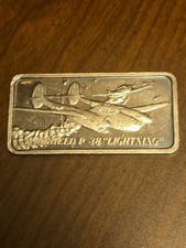 1976 Hamilton Mint Lockheed P-38 World of Flight 1 Oz .999 Silver Art Bar  picture