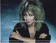 TINA TURNER AUTOGRAPHED 8 1/2 X 11 COLOR PHOTO / COA picture