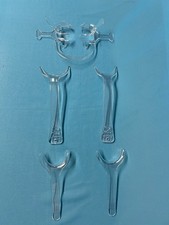 5 different clear, immaculate cheek retractors for photography & procedures. picture