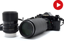 Canon A-1 SLR Film Camera Black FD 100-300mm F/5.6 Tokina 35-70mm F/3.5 Lens picture