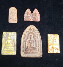 A collection of Buddhist Amulets Thailand Burma monastery gold leaf Elephant art picture