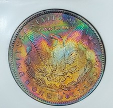  1884 O Morgan Silver Dollar Under graded MS60 by PCI / Rainbow REV AND PL OBV. picture