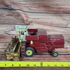 Vintage Ertl 1/32 scale die-cast New Holland Combine parts/repair red/yellow picture