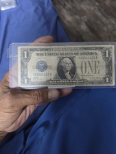 $1 1928 A   SILVER CERTIFICATE FUNNY BACK  S/N  H 31864863 A  PMG 66  Fr. 1601 picture