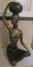 MCM KARL HAGENAUER STYLE LARGE BRASS SCULPTURE of SEATED AFRICAN WOMEN w/ BASKET picture