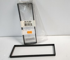 New - Metra 3/8” thick Single-Din spacer #89-30-3900, trim ring picture