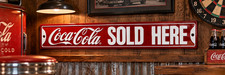 COCA~COLA SOLD HERE Street Sign Ande Rooney Embossed Metal Soda Sign, 6” x 36” picture