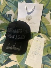 Rare signed “Make America Great Again” Black w receipt “Never Surrender version” picture