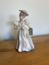 Vintage Lefton hand-painted porcelain Victorian lady with a muff, model 3427. picture