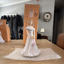 Porcelain Sweet 16 Girl Figurine Holding 