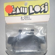 Team Losi Vintage A-2001 Rear Bulkhead Black 1:10 Electric RC Part picture