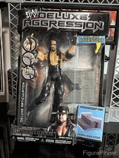 WWE Jakks Deluxe Aggression Undertaker Series 15 Wrestling Figure box has ware picture
