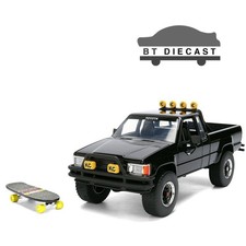 JADA BACK TO THE FUTURE 1985 TOYOTA SR5 PICK UP MARTY'S SKATEBOARD 1/24 BK 36479 picture