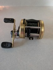 Abu Garcia Ambassadeur 6600-D5 Fishing Reel. Faded & Scuffed But Works. picture